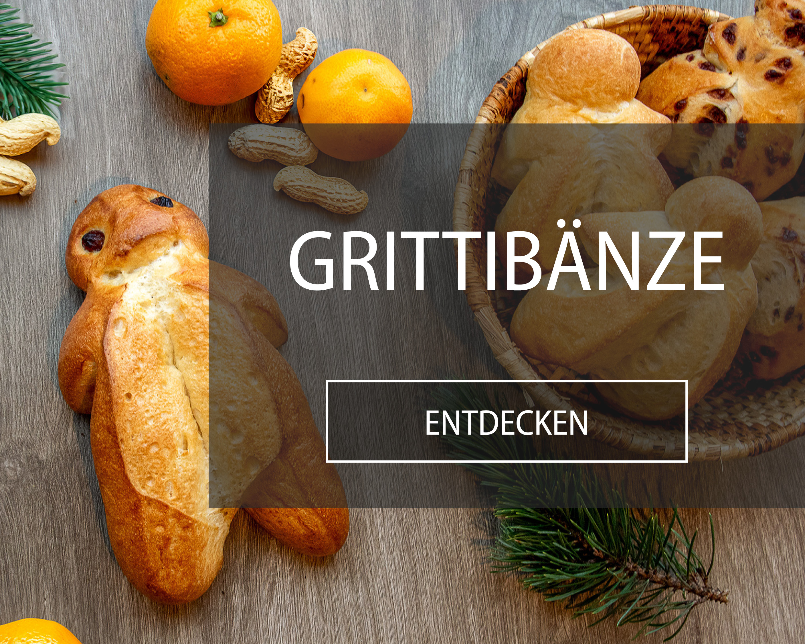 Grittibänzen mit Erdnüssli und Tannenzweig.